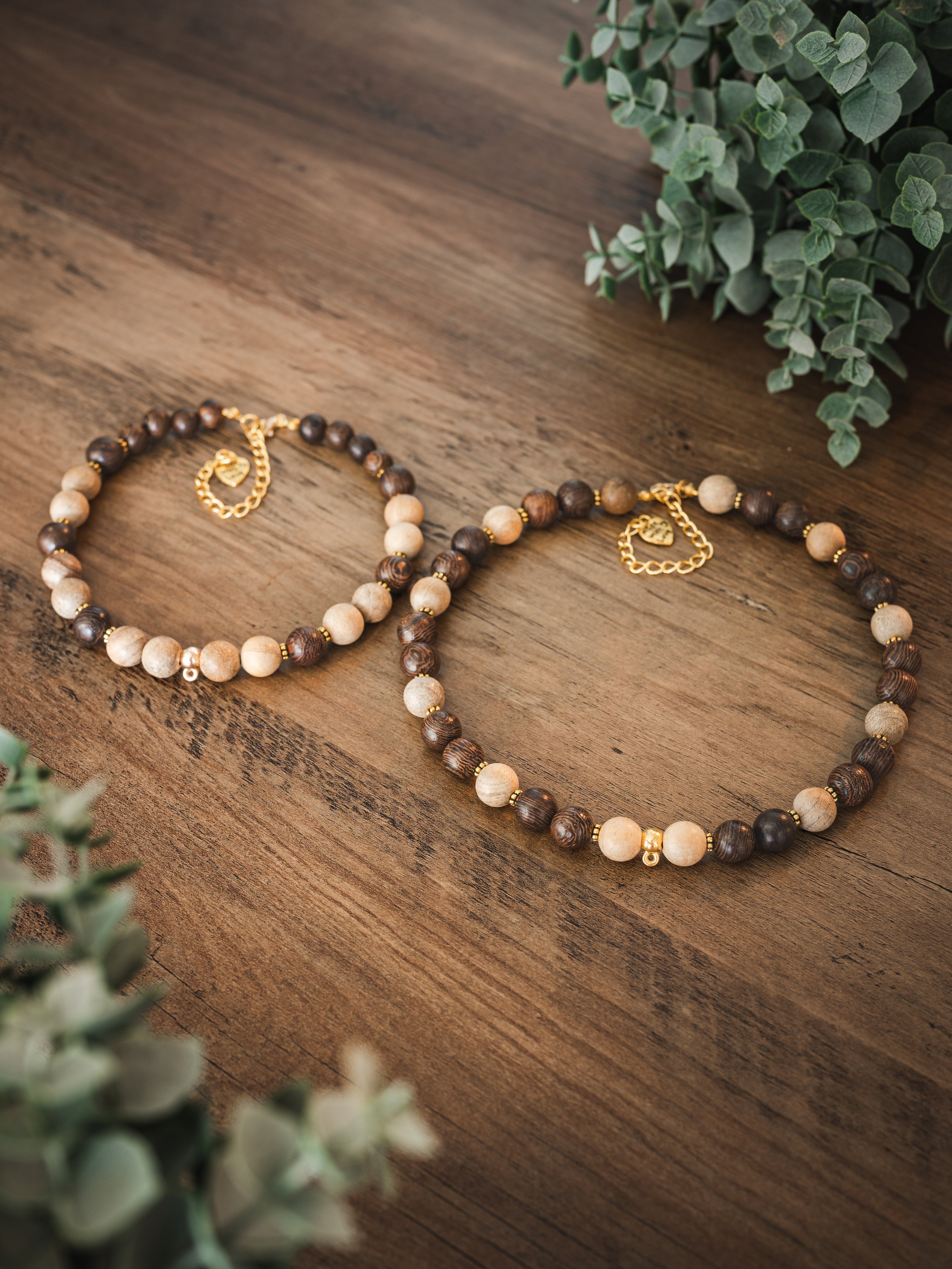 Brown wood and sandalwood bead pet necklace with gold accents