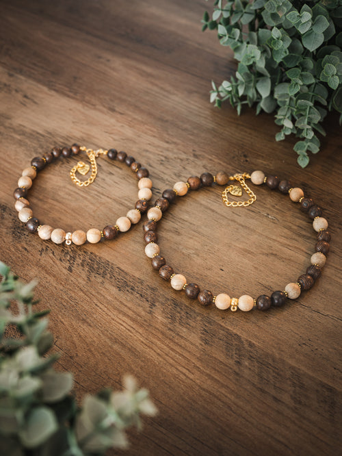 Brown wood and sandalwood bead pet necklace with gold accents