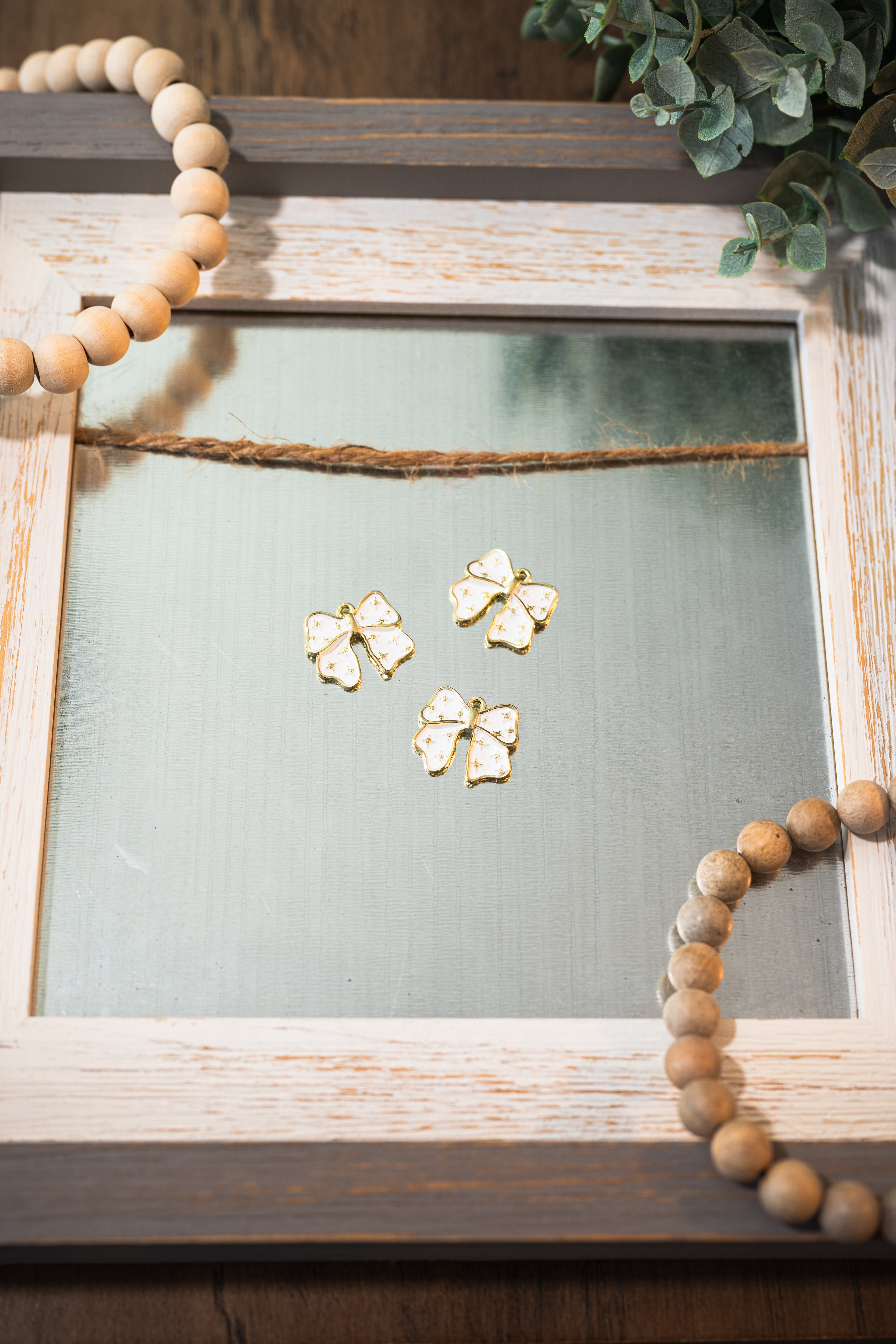 White & Gold Colour Plated Bow Charm