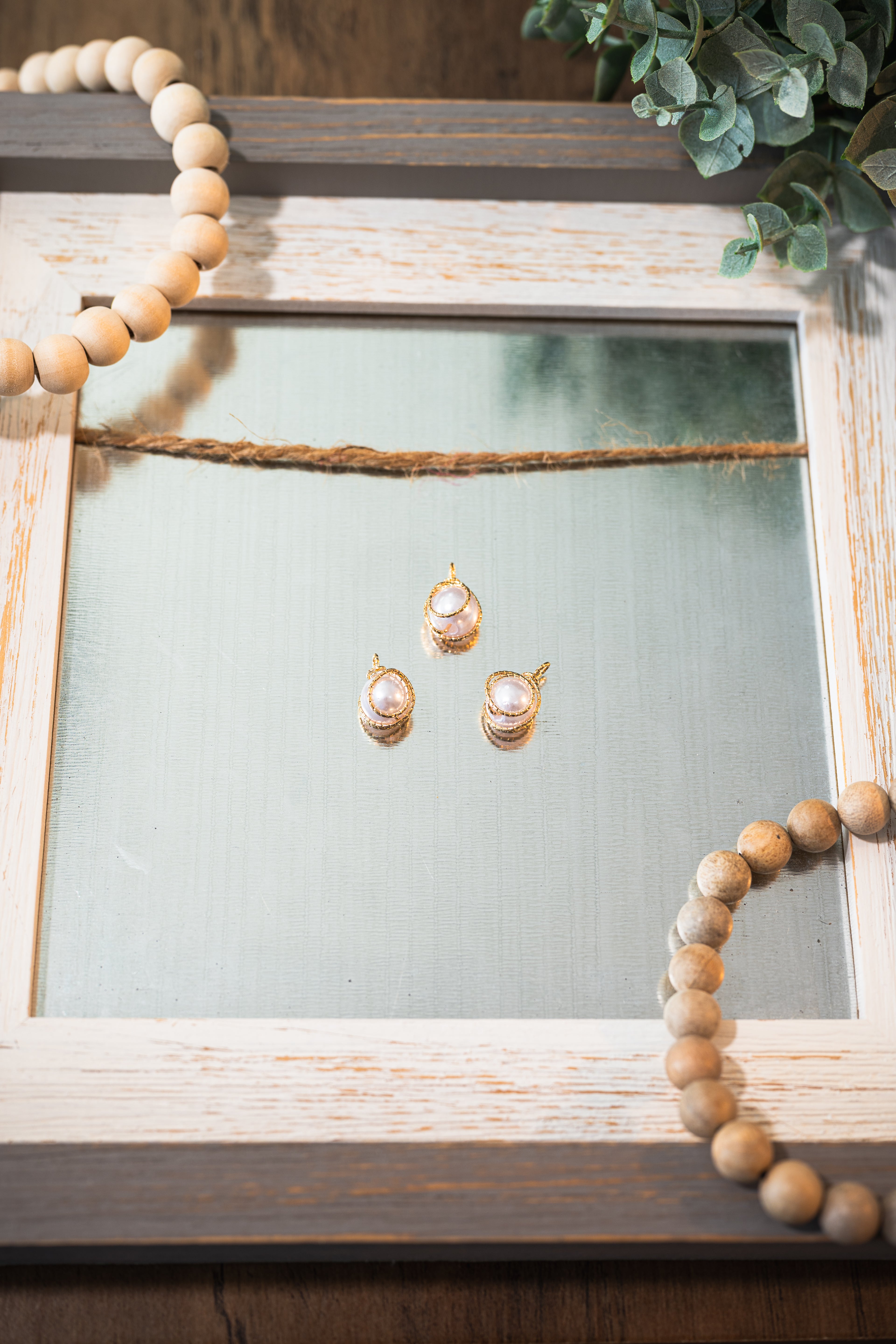 Round Pearl Pendant Charm with Gold Colour Plated Ribbon Wrap